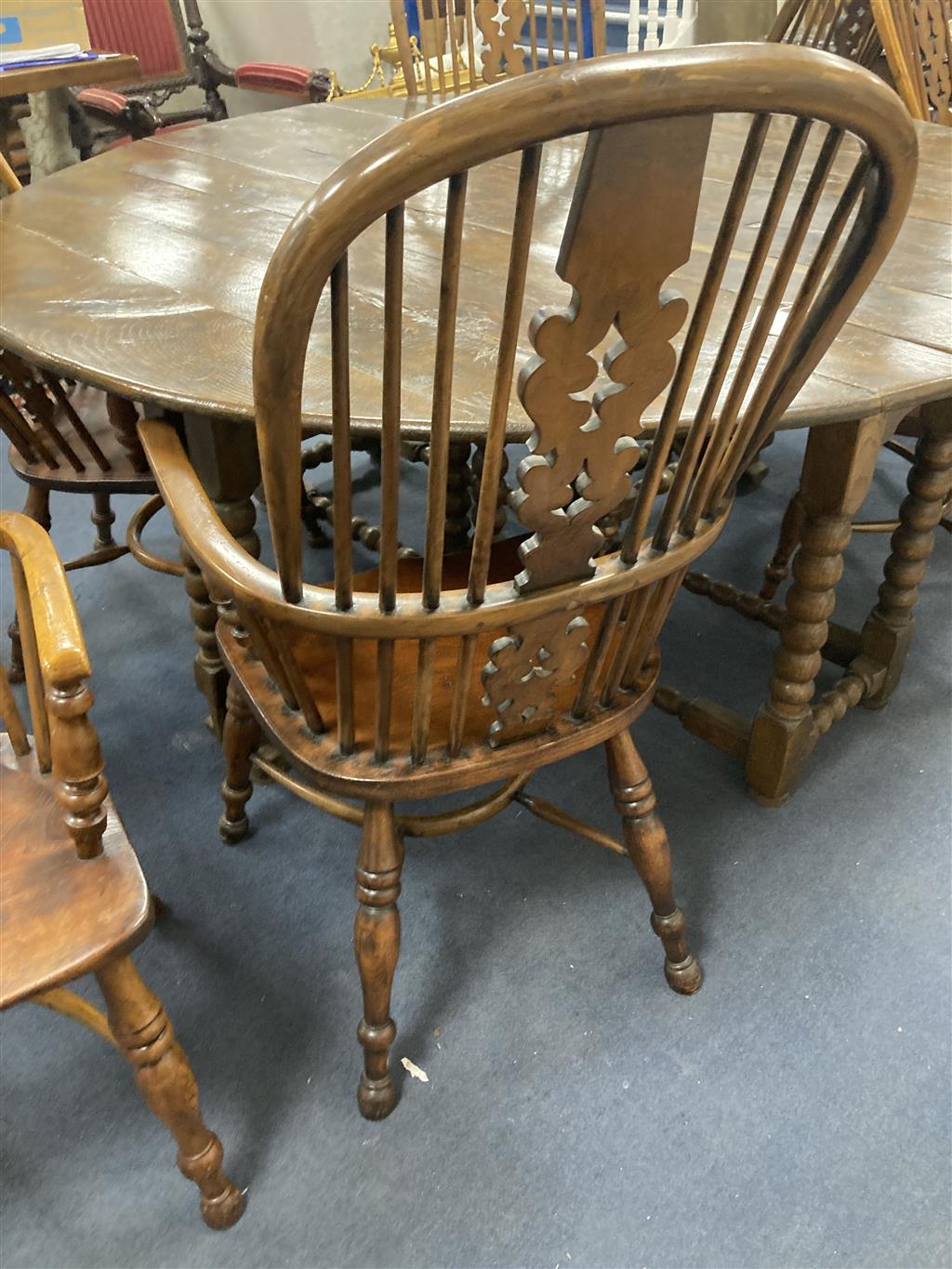 A set of eight 19th century and later Yorkshire area yew, elm and ash Windsor armchairs